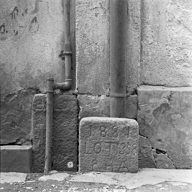 boundary stone with inscriptions: â€œ1881. Lot 1358. RHAâ€