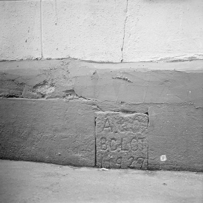boundary stone with inscriptions: â€œB.C. Lot 11927â€