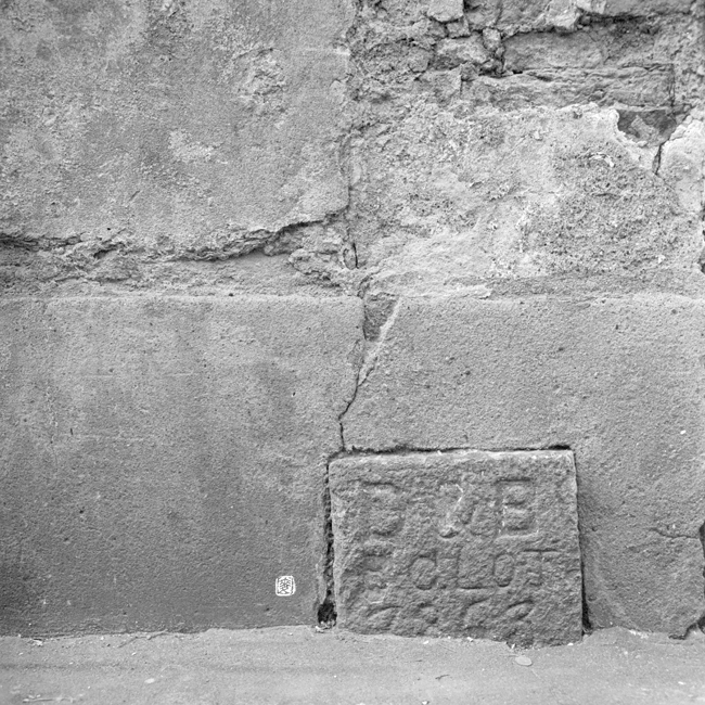 boundary stone with inscriptions: â€œD&B. B.C. Lot 7853â€